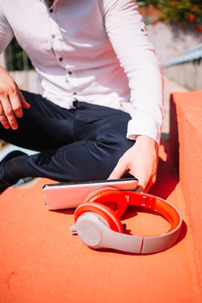 sitting man with earphones 23 2148000253